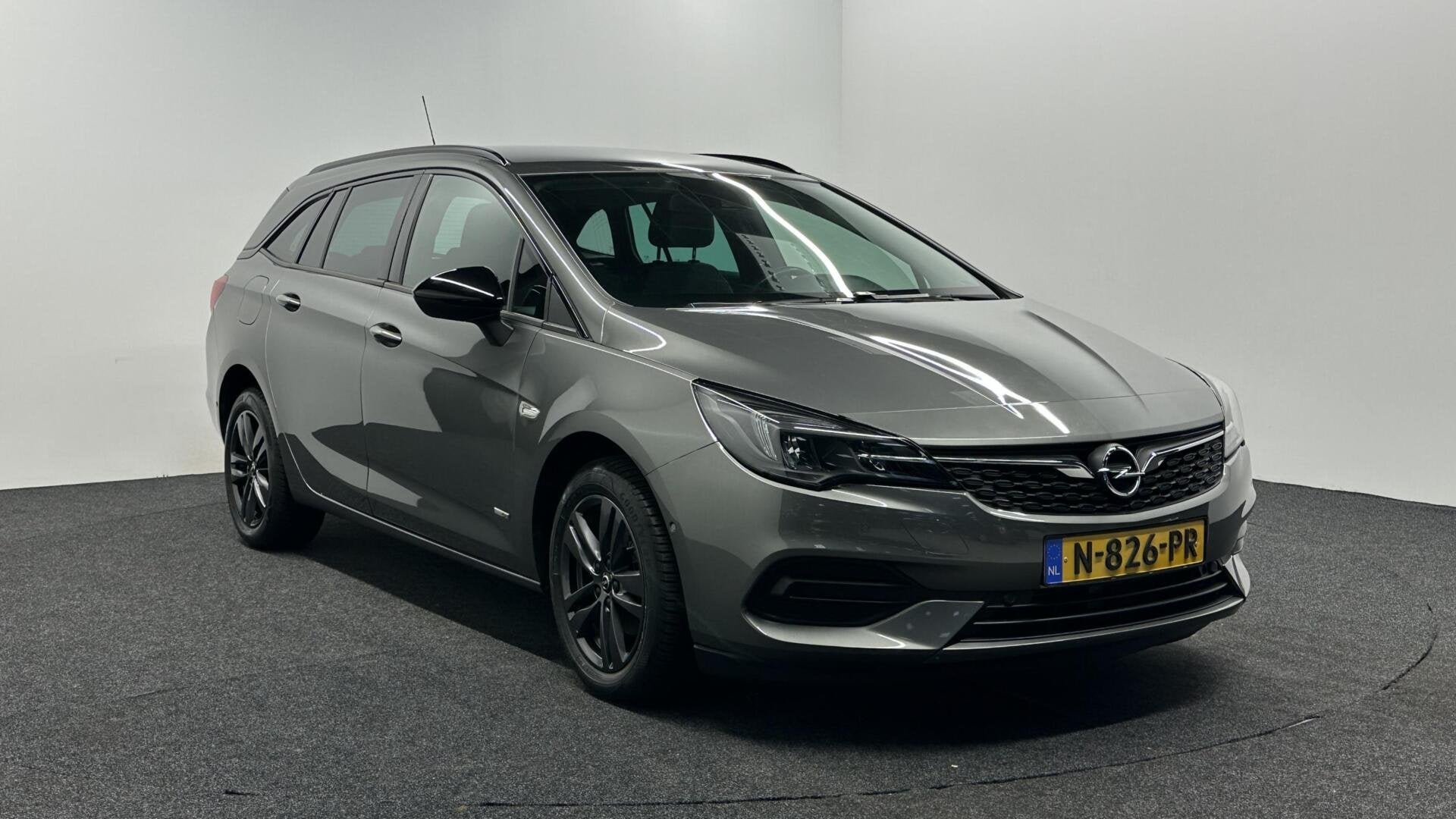 Opel Astra Sports Tourer 1.2 Design & Tech NAVI ECC CRUISE L, Auto's, Voorwielaandrijving, Stof, Gebruikt, 1199 cc