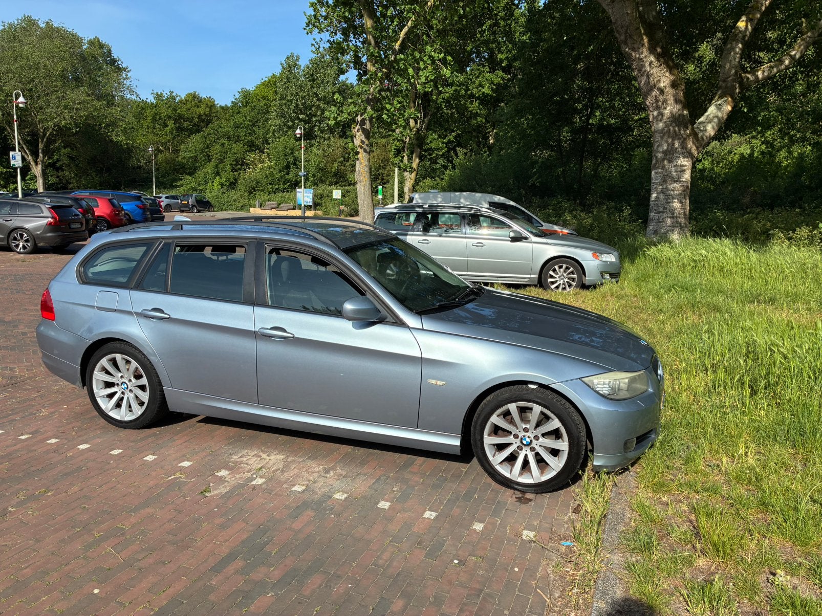 BMW 3-Serie 2.0 318 I Touring 2010 Business Line, Auto's, Achterwielaandrijving, Blauw, Origineel Nederlands, Handgeschakeld