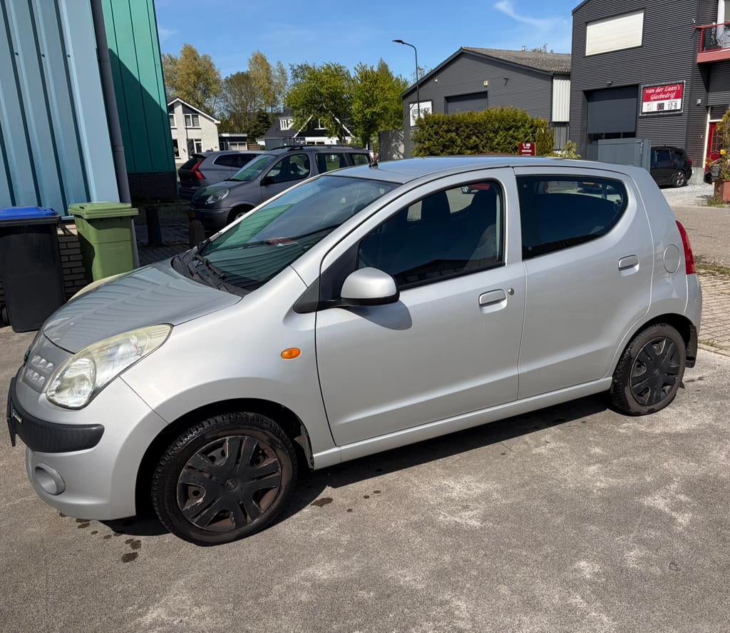 Nissan Pixo 1.0 50KW 5D 2011 Grijs, Auto's, Nissan, Voorwielaandrijving, Stof, Handgeschakeld, 3 cilinders