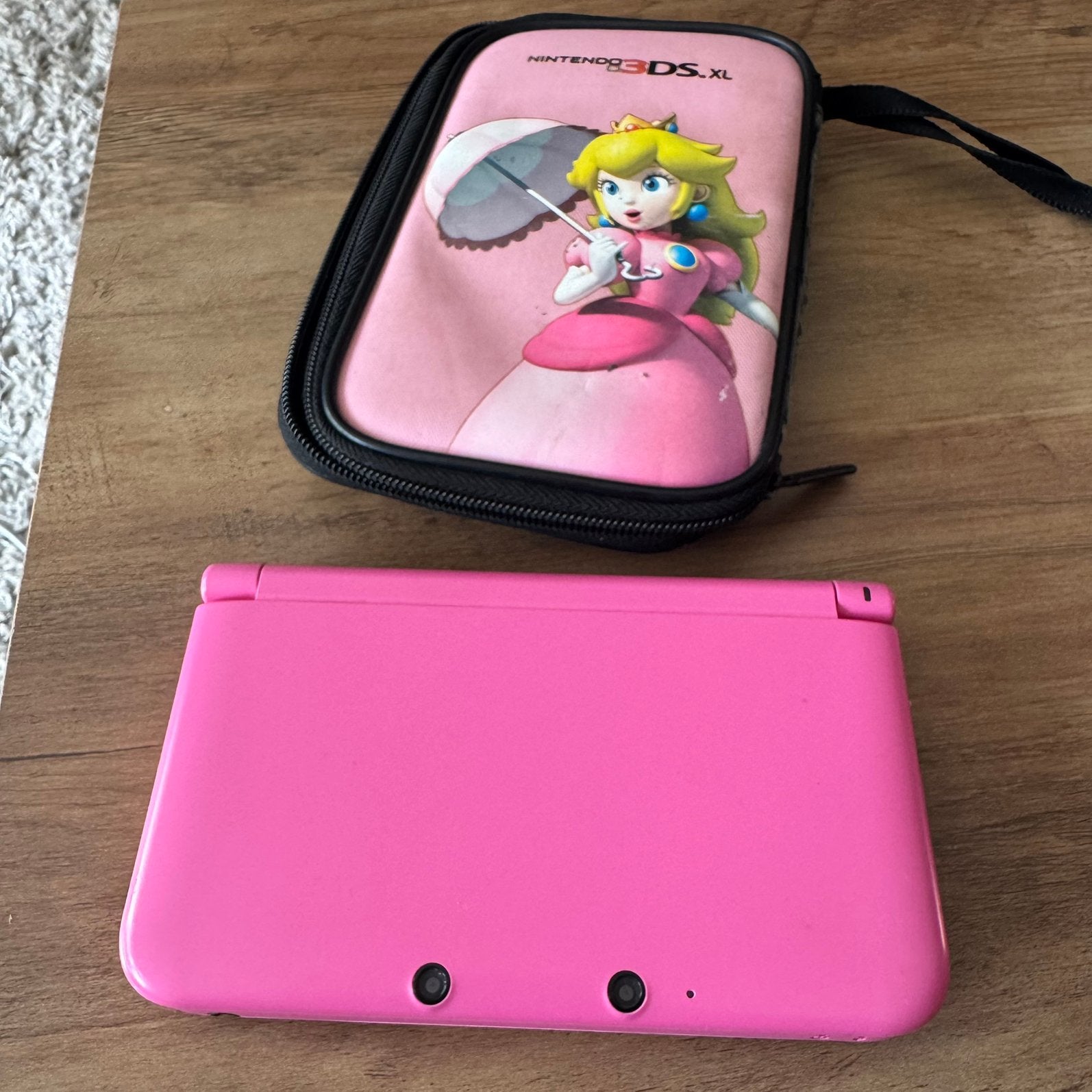 3DS XL Roze met hoesje, Spelcomputers en Games, Met games, 3DS XL, Ophalen of Verzenden, Zo goed als nieuw