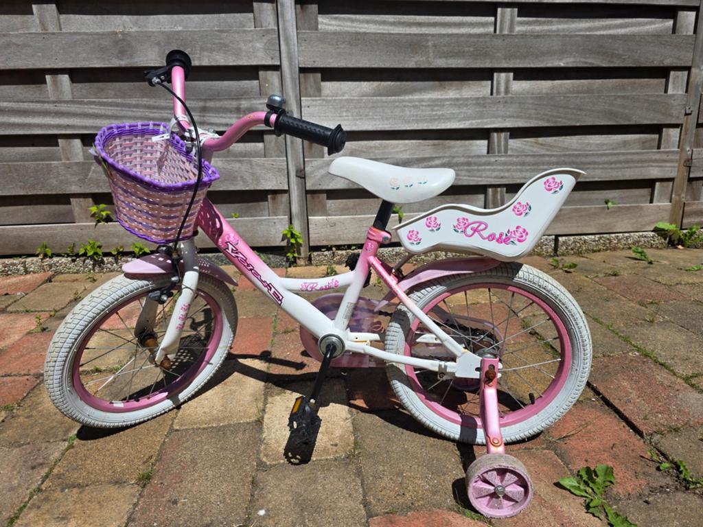 Meisjesfiets 16 inch - Roze met zijwieltjes en mandje, Fietsen en Brommers, Fietsen | Meisjes, Ophalen, Terugtraprem, Gebruikt