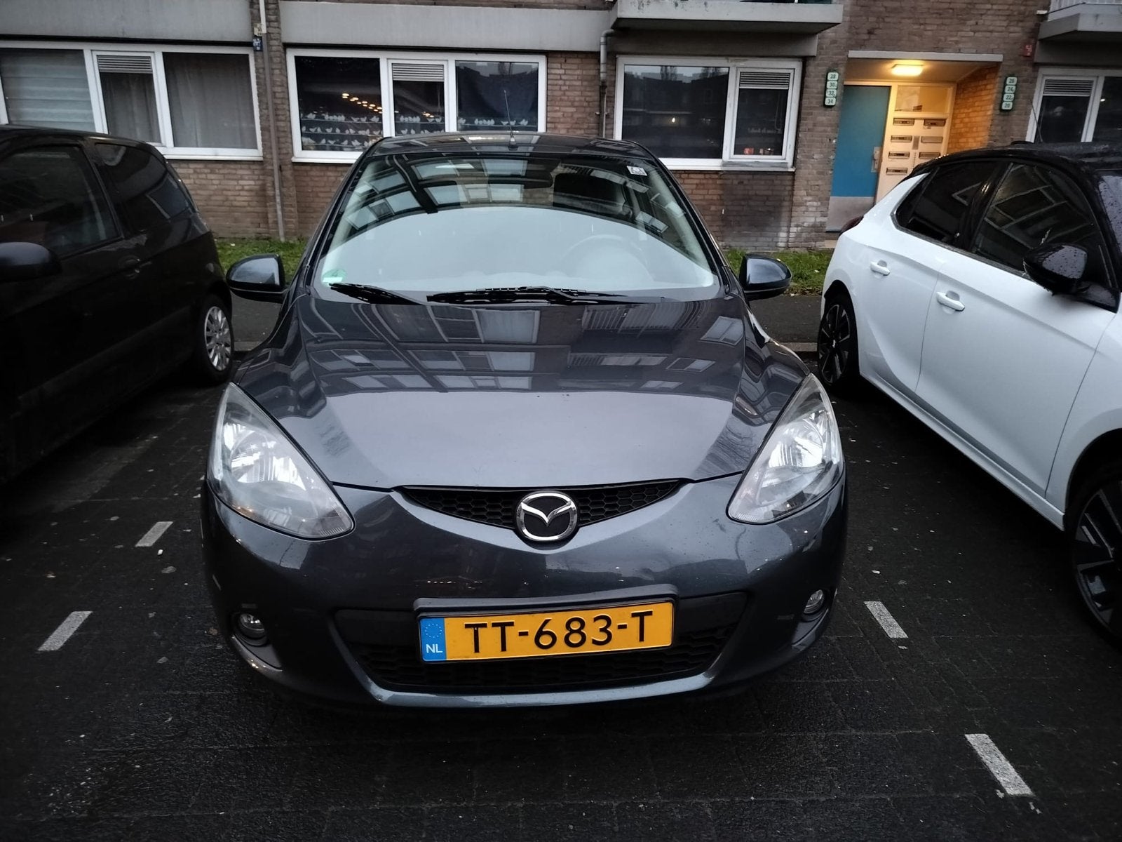 Mazda 2010 Grijs, Auto's, Stof, 74 pk, 31 €/maand, 4 cilinders
