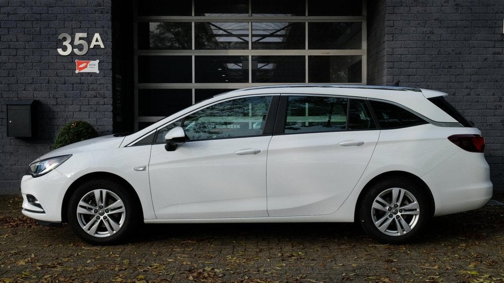 Opel Astra Sports Tourer 1.4 Business+ Cruise|Navi|Media|Tre, Auto's, Voorwielaandrijving, Stof, Gebruikt, 4 cilinders