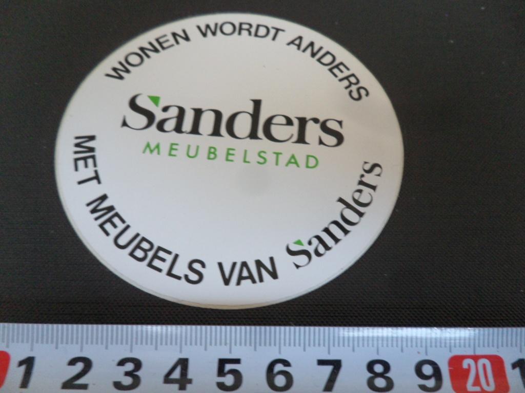 sticker SANDERS meubelstad wonen wordt anders, Ophalen, Zo goed als nieuw