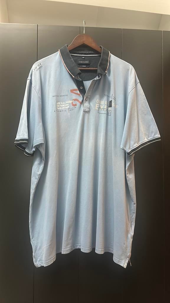 Lichtblauwe polo met tekst op de borst, Ophalen of Verzenden, Gedragen, Overige maten, Blauw