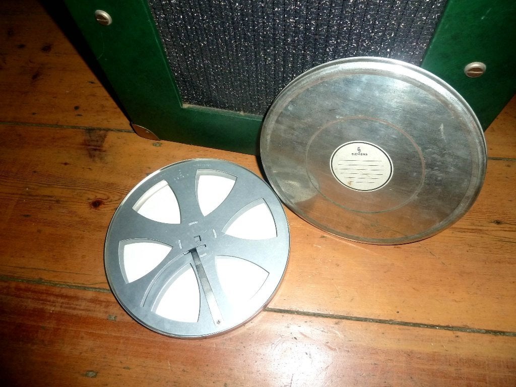 16mm film Siemens klemspoel met blik - label 24cm nieuw, Ophalen of Verzenden, 16mm film