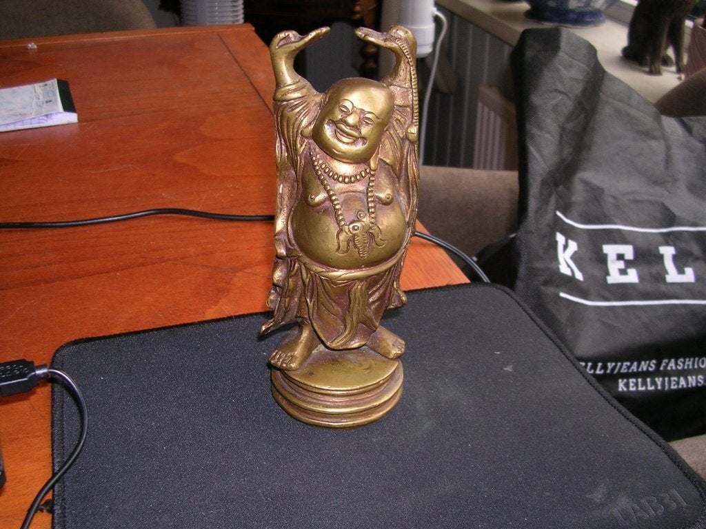 Een 26 cm hoge bronzen  Buddha beeldje en heel zwaar., Ophalen of Verzenden, Brons