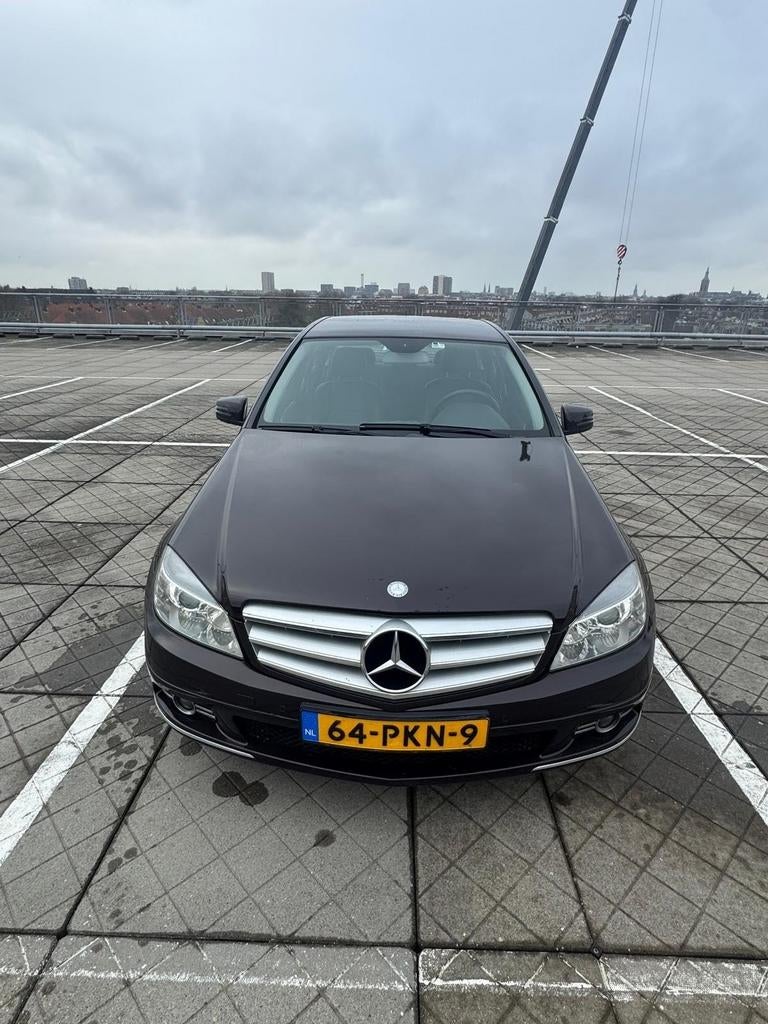 Mercedes-Benz C-Klasse 1.8 C180 CGI Sedan AUT 2011 Bruin, Automaat, 745 kg, Achterwielaandrijving, 1800 kg