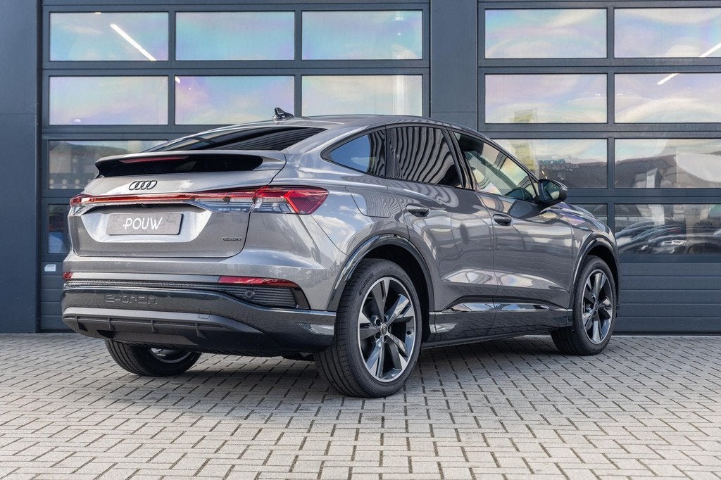 Audi Q4 Sportback e-tron 45 quattro 286pk S Edition Competit, Auto's, Audi, Automaat, 12 maanden, Zwart, 82 kWh