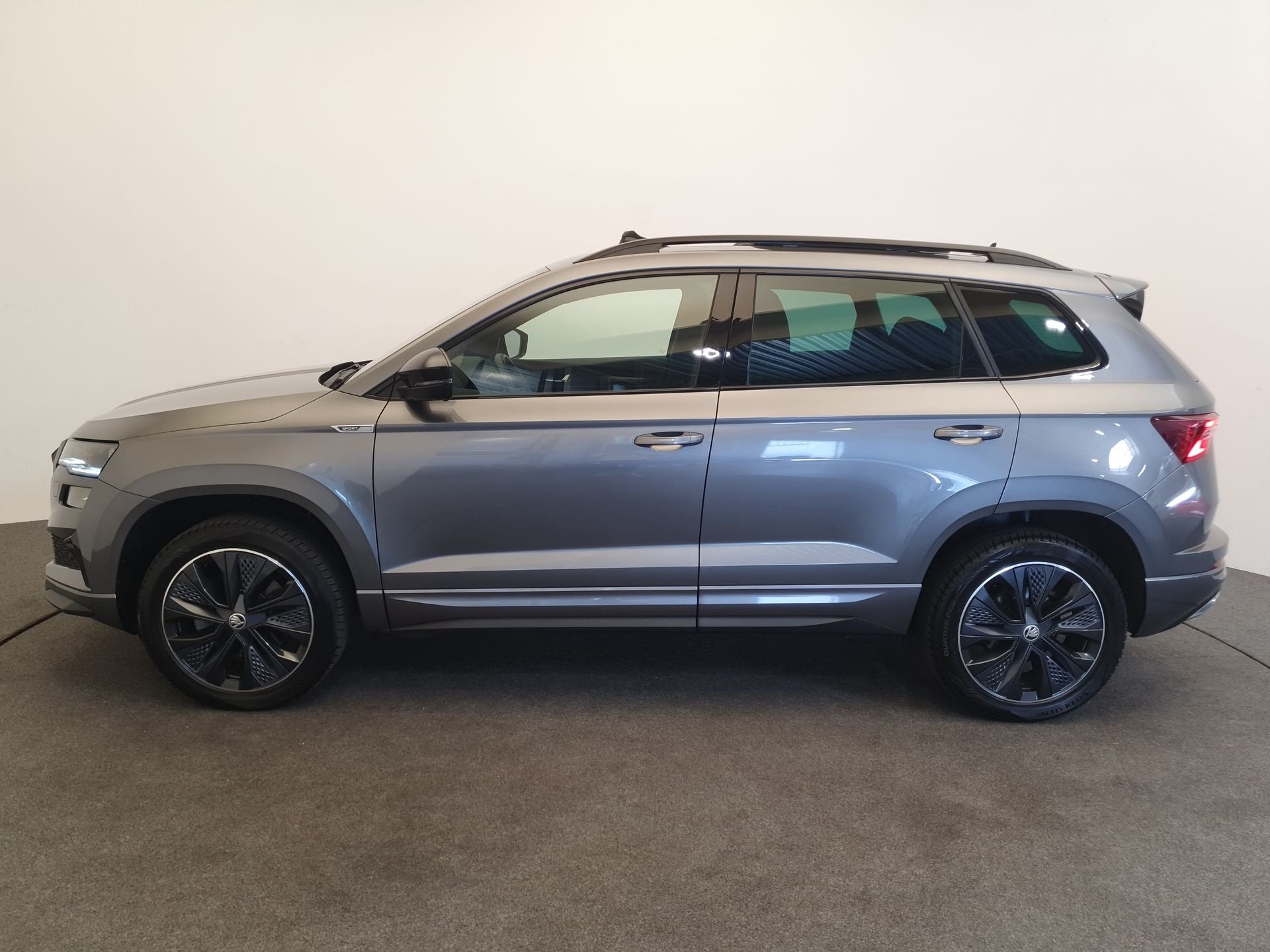 Skoda Karoq 1.5 TSI ACT 150pk DSG/AUT Sportline Business Pan, Auto's, Stof, 4 cilinders, Karoq, Bedrijf