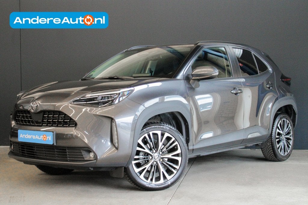 Toyota Yaris Cross 1.5 Hybrid 130 Executive |dealer onderhou, Auto's, 1195 kg, Gebruikt, Zwart, Leder en Stof