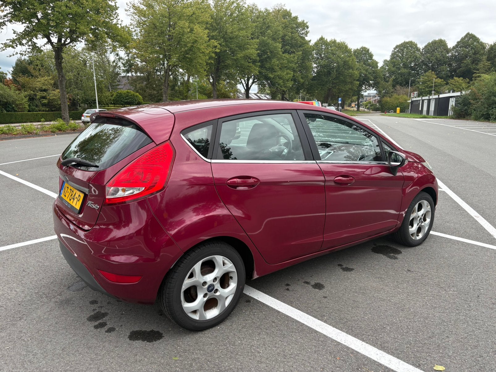 Ford Fiësta 1.25 Titanium 44KW 5DR 2010 Rood, Voorwielaandrijving, 40 €/maand, 1242 cc, 4 cilinders