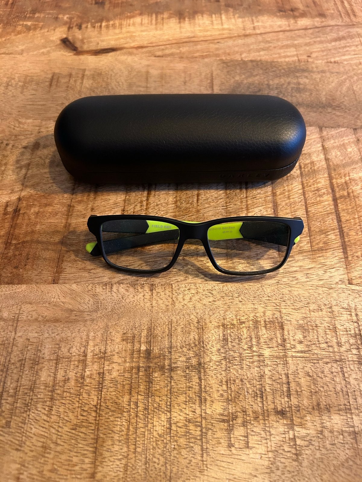 Kinderbril montuur Oakley zwart-geel, Ophalen of Verzenden, Zo goed als nieuw, Overige typen, Zwart