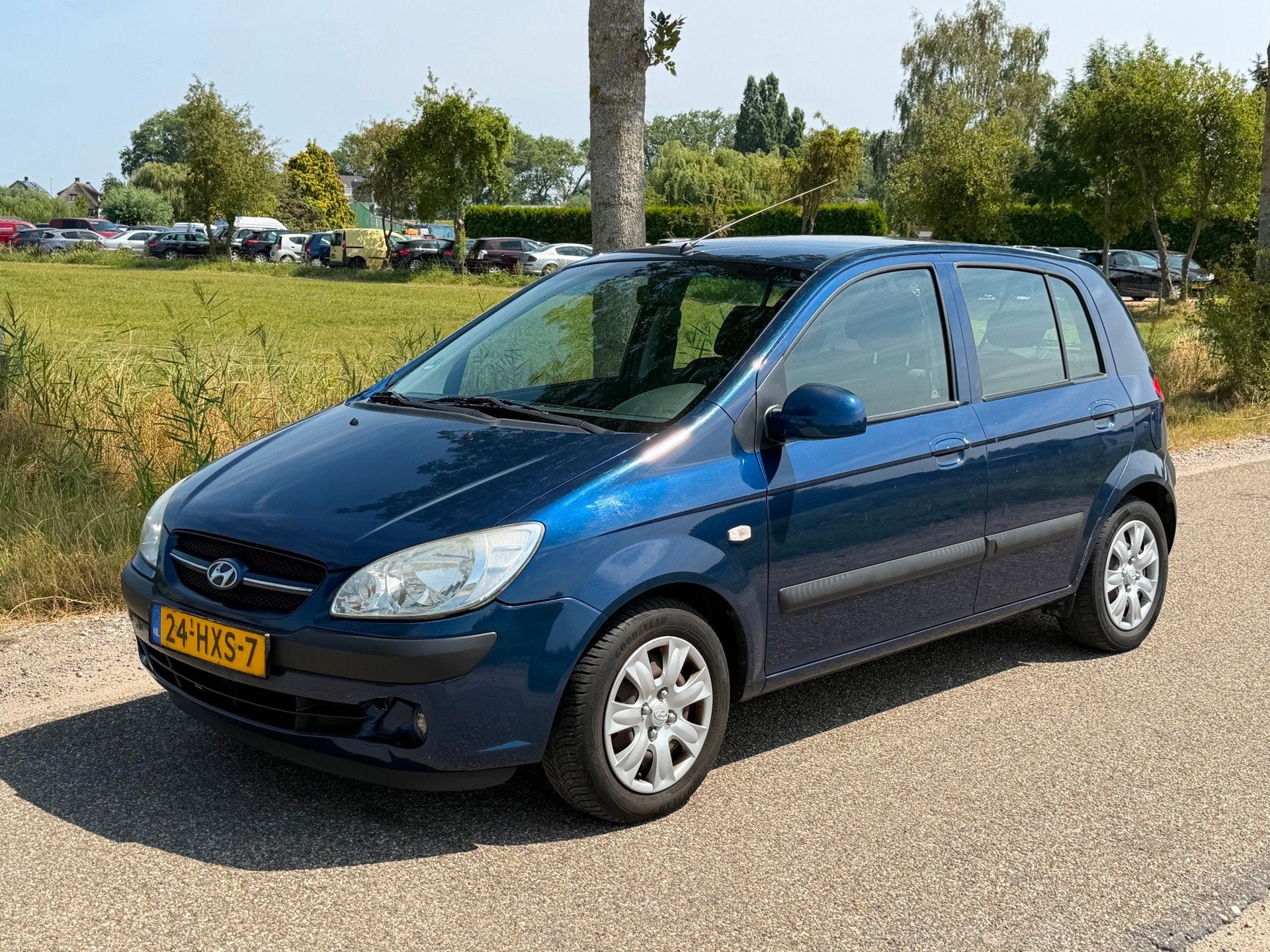 Hyundai Getz 1.4i Active Cool APK 10-2027 Airco NAP, Auto's, Hyundai, Voorwielaandrijving, Zwart, 4 cilinders, Blauw