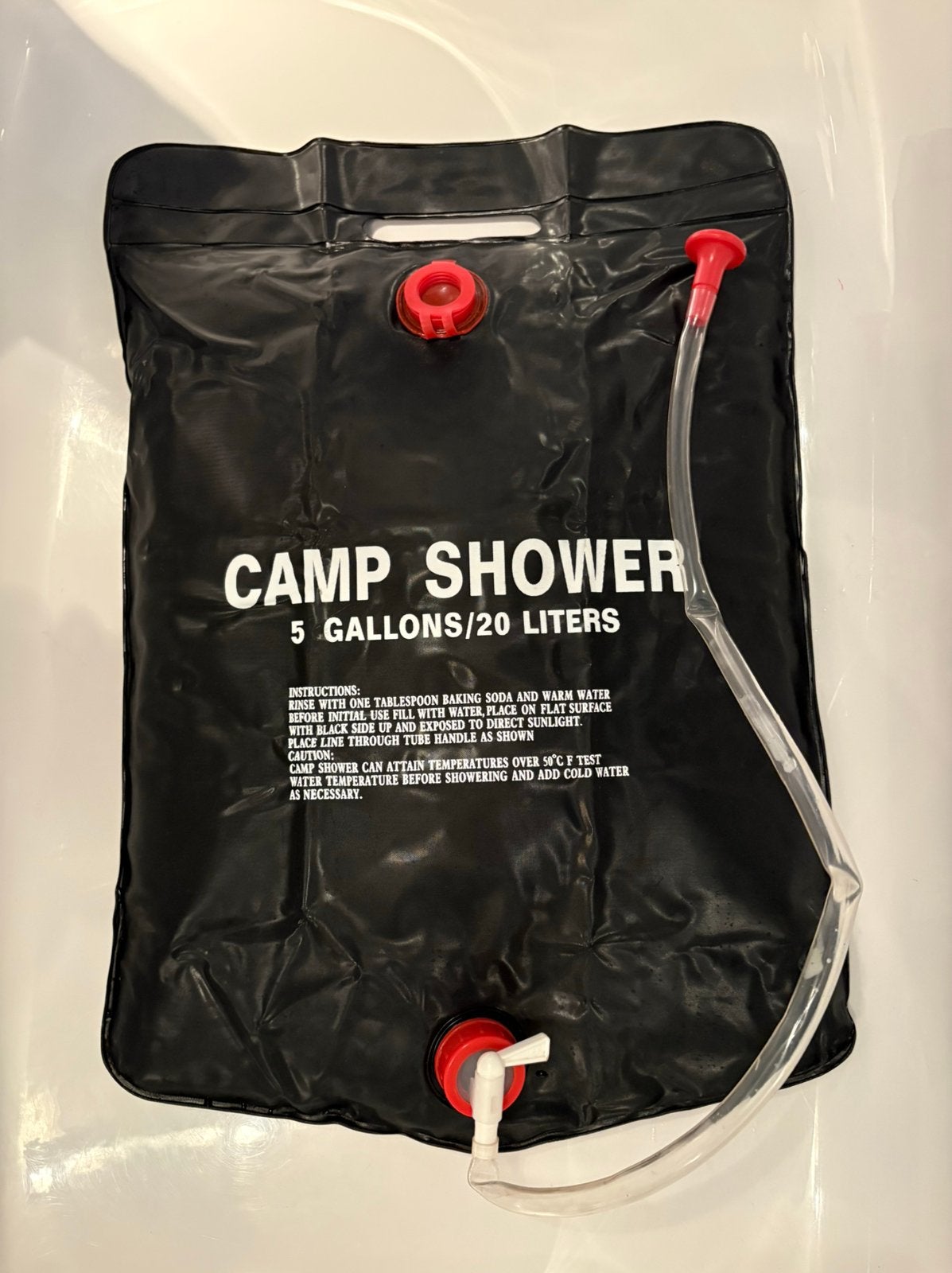 Campingdouche solar 20L met haak, Caravans en Kamperen, Kampeeraccessoires, Ophalen of Verzenden, Zo goed als nieuw