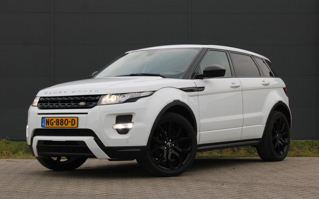 Land Rover Range Rover Evoque 2.0 Si 4WD Prestige Meridian P, Auto's, Land Rover, Euro 5, Zwart, 4 cilinders, Wit