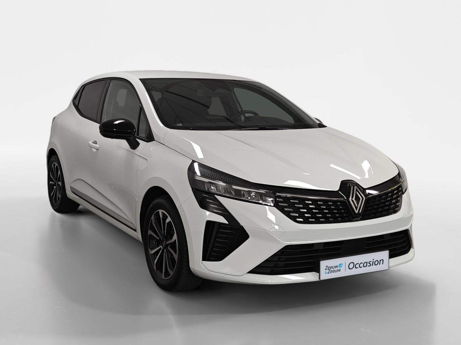 Renault Clio 1.6 E-Tech Full Hybrid 145 techno AUTOMAAT NAVI, Auto's, 12 maanden, Euro 6, Leder en Stof, Wit