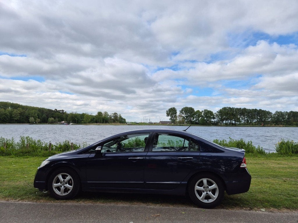Honda Civic 	CIVIC 4DR HYBRID blauw, Auto's, Euro 5, Lederen bekleding, Beige, Blauw