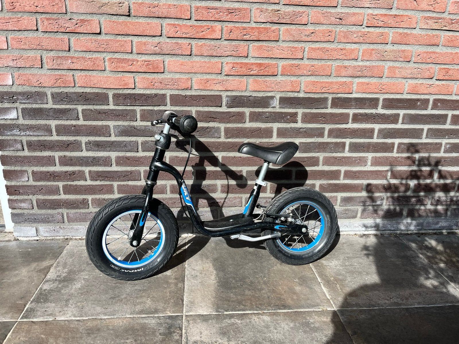 Puky loopfiets zwart/blauw, Fietsen en Brommers, Ophalen of Verzenden, Gebruikt, Velgrem, Minder dan 16 inch