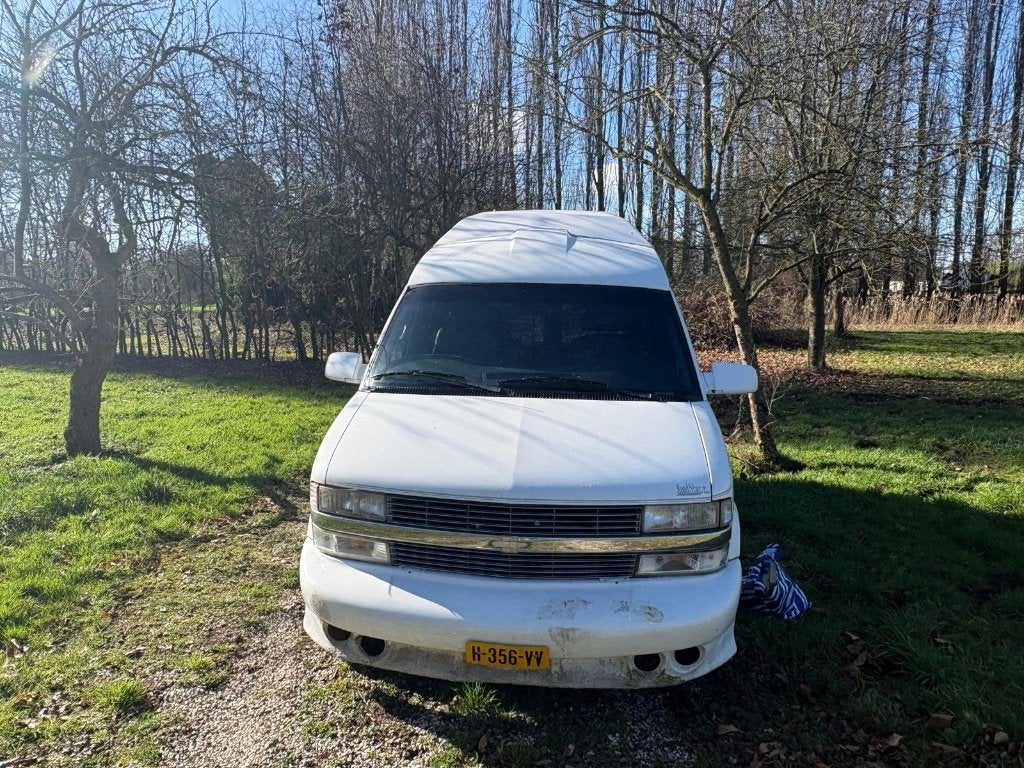Chevrolet Astro 4.3 V6 Camper (Kenteken: Kampeerwagen), Auto's, Chevrolet, Automaat, Wit, Leder, 500 kg