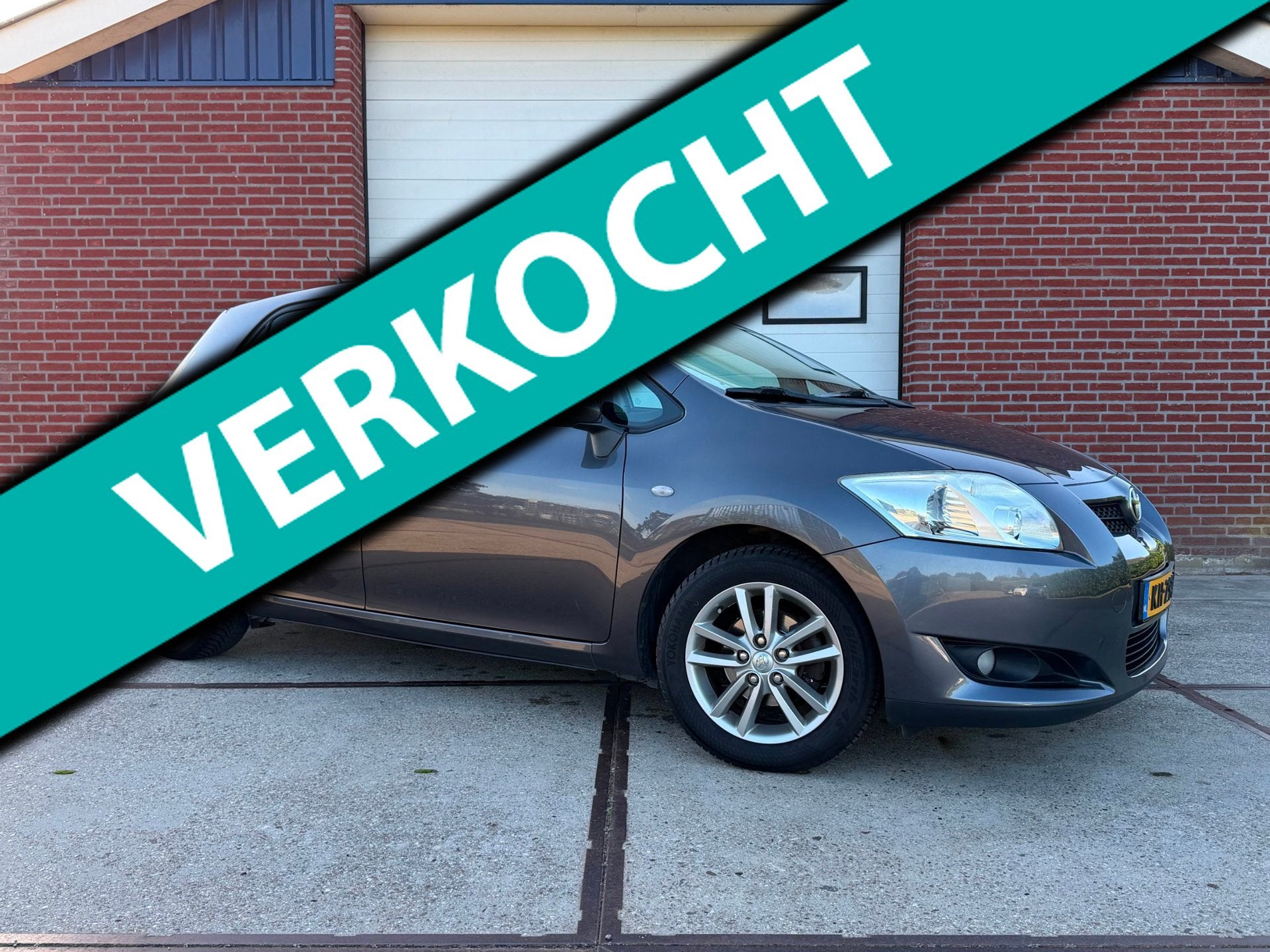 Toyota Auris 1.3 Comfort Trekhaak PDC, Auto's, Dealer onderhouden, Gebruikt, Zwart, Verwarmde buitenspiegels
