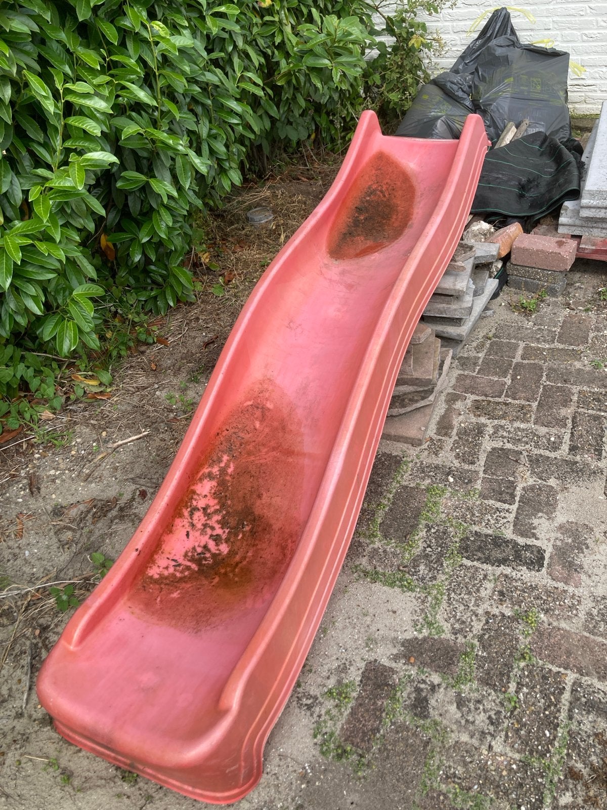 Glijbaan met gebruikssporen, Ophalen, Gebruikt