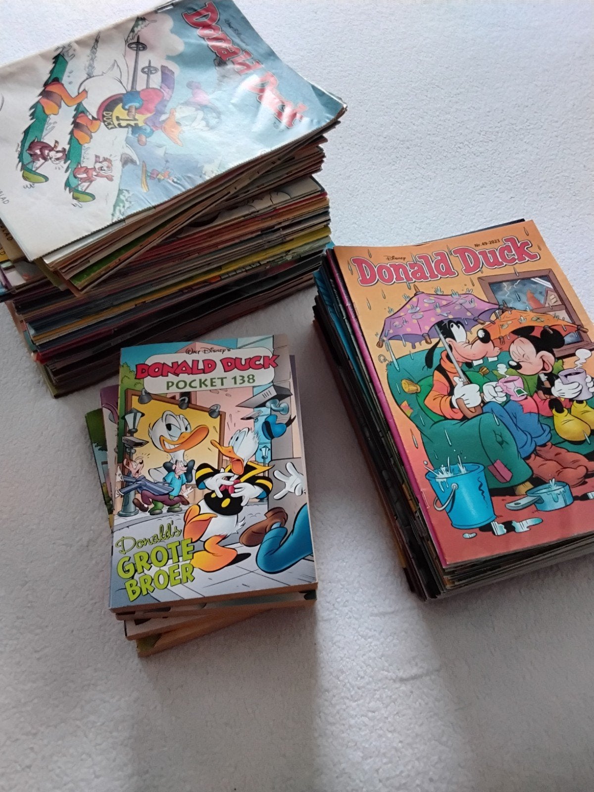 Grote collectie Donald Duck stripboeken en pockets, Boeken, Ophalen