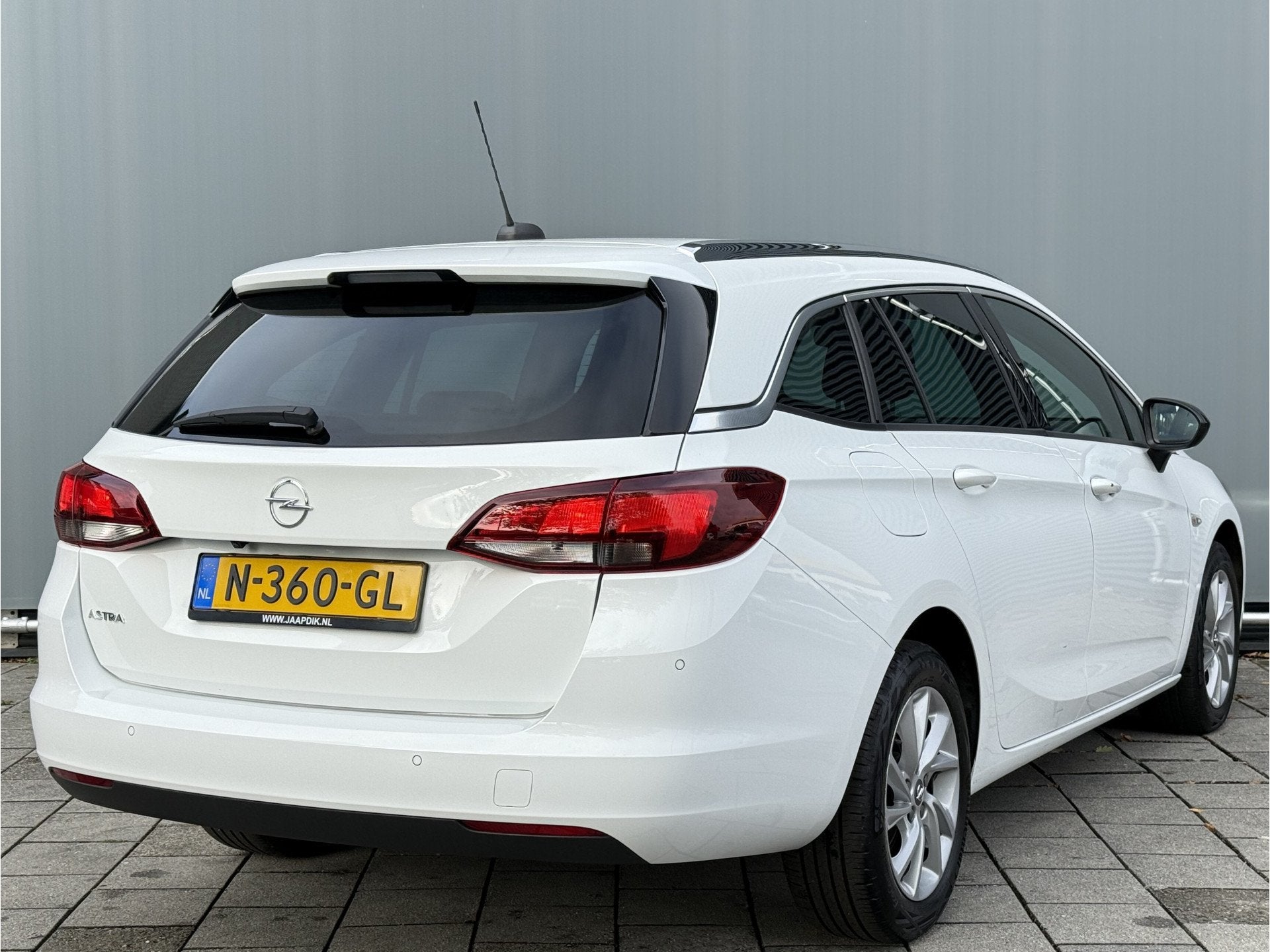 Opel Astra Sports Tourer BWJ 2021 | 1.2T 131PK Bus Elegance, Auto's, Opel, 1199 cc, Leder en Stof, Wit, Origineel Nederlands