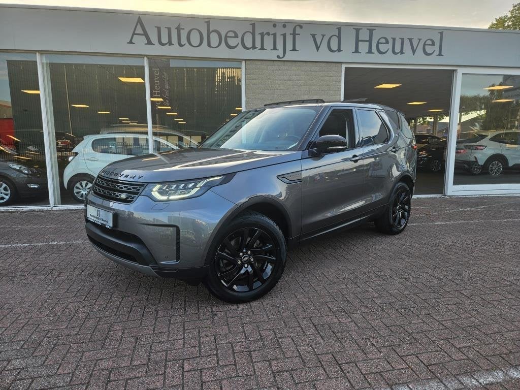 Land Rover Discovery 2.0 Si4 HSE Luxury 5 pers. 3500kg trekg, Auto's, Land Rover, Automaat, Gebruikt, Zwart, Bedrijf