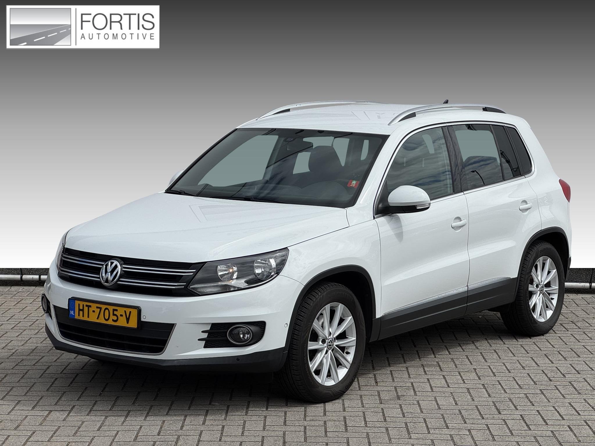 Volkswagen Tiguan 1.4 TSI Sport&Style NL-AUTO | TREKHAAK 180, Voorwielaandrijving, Euro 5, 15 km/l, Zwart