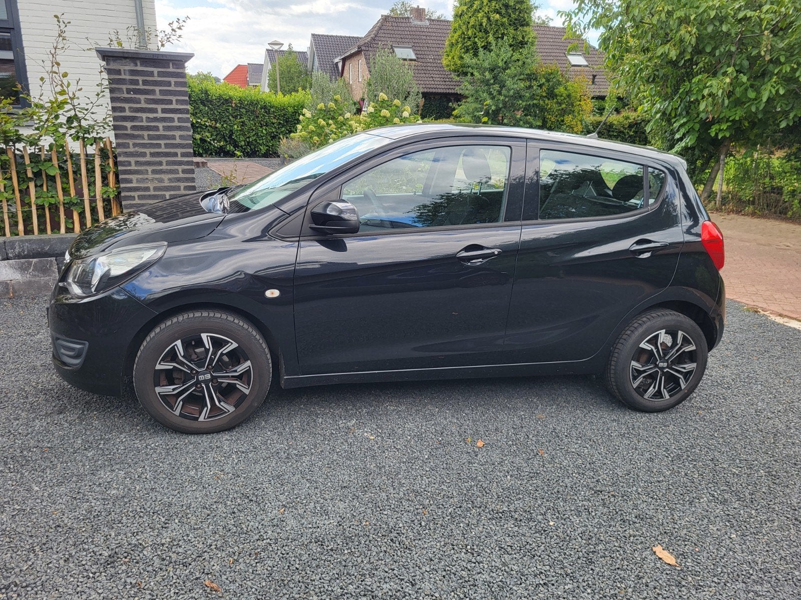Opel Karl 1.0 Ecoflex 55KW 2015 Zwart, Auto's, Opel, Voorwielaandrijving, 74 pk, 4 stoelen, Zwart