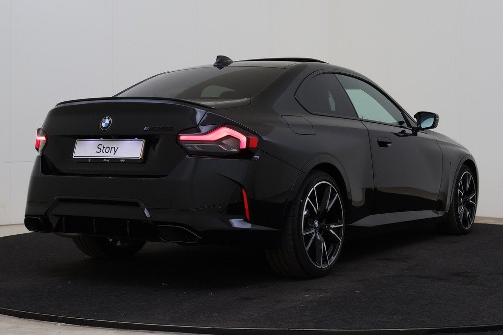 BMW 2 Serie Coupe M240i xDrive High Executive Automaat / Sch, Auto's, BMW, Gebruikt, Euro 6, Met garantie (alle), 4 stoelen