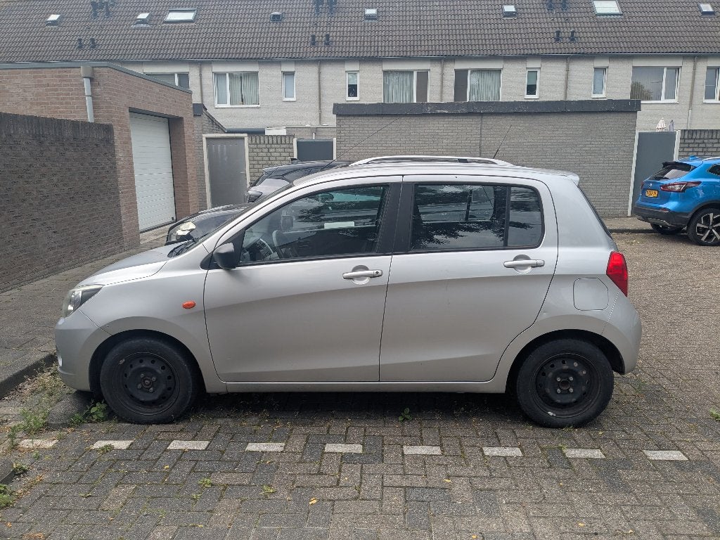 Suzuki Celerio 1.0 Dualjet 50KW 2016 Grijs, Auto's, Zwart, 400 kg, 68 pk, Origineel Nederlands