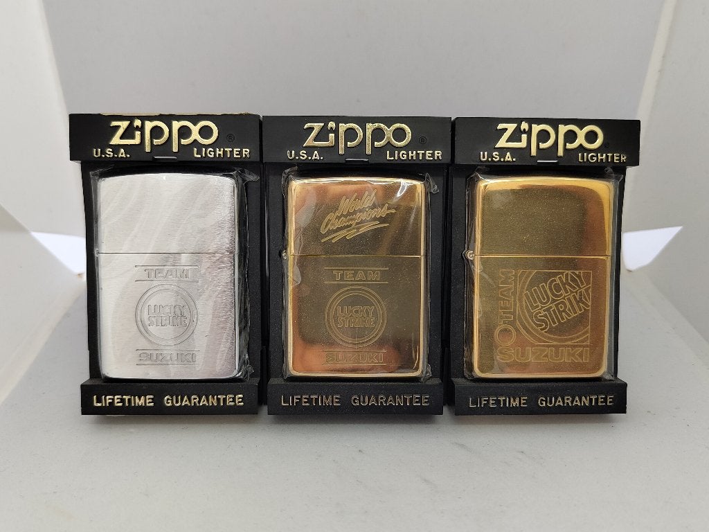 3x Zippo Team Suzuki Lucky Strike - EXTREEM ZELDZAAM, Ophalen of Verzenden, Zo goed als nieuw, Aansteker