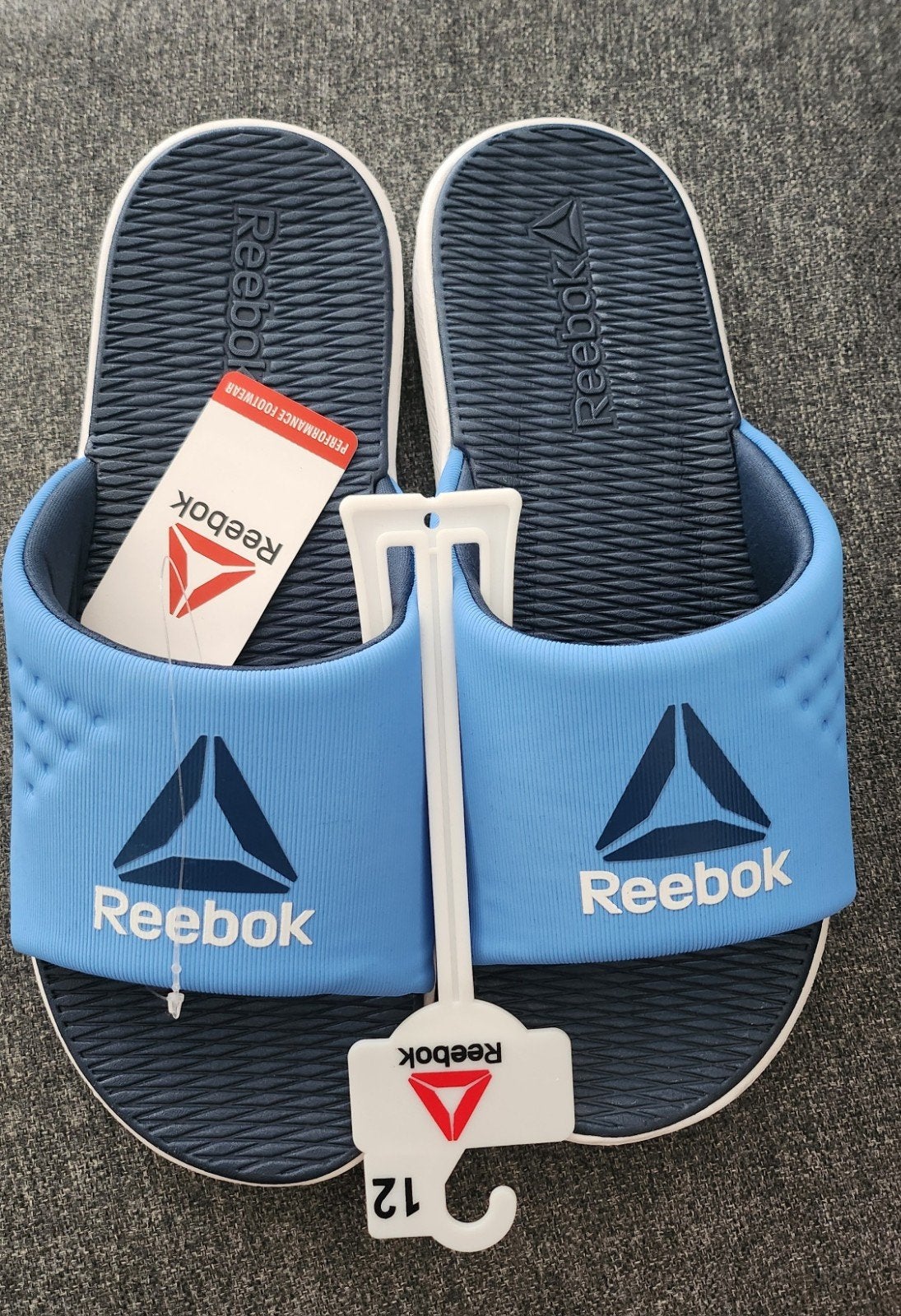 Reebok slippers - Nieuw maat 45, Kleding | Heren, Slippers, Blauw, Nieuw, Ophalen of Verzenden