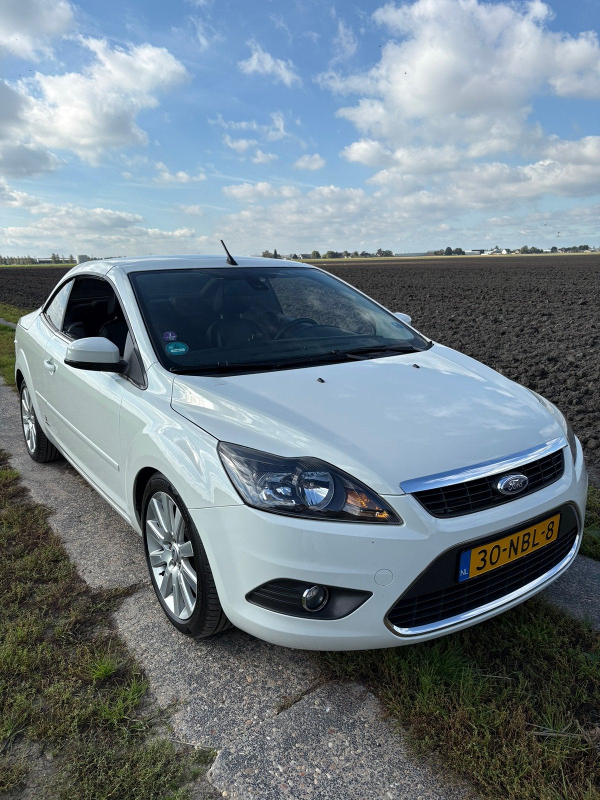 Ford Focus 2.0 107KW Cabrio 2010 Wit, Auto's, 4 cilinders, Cabriolet, 4 stoelen, Wit