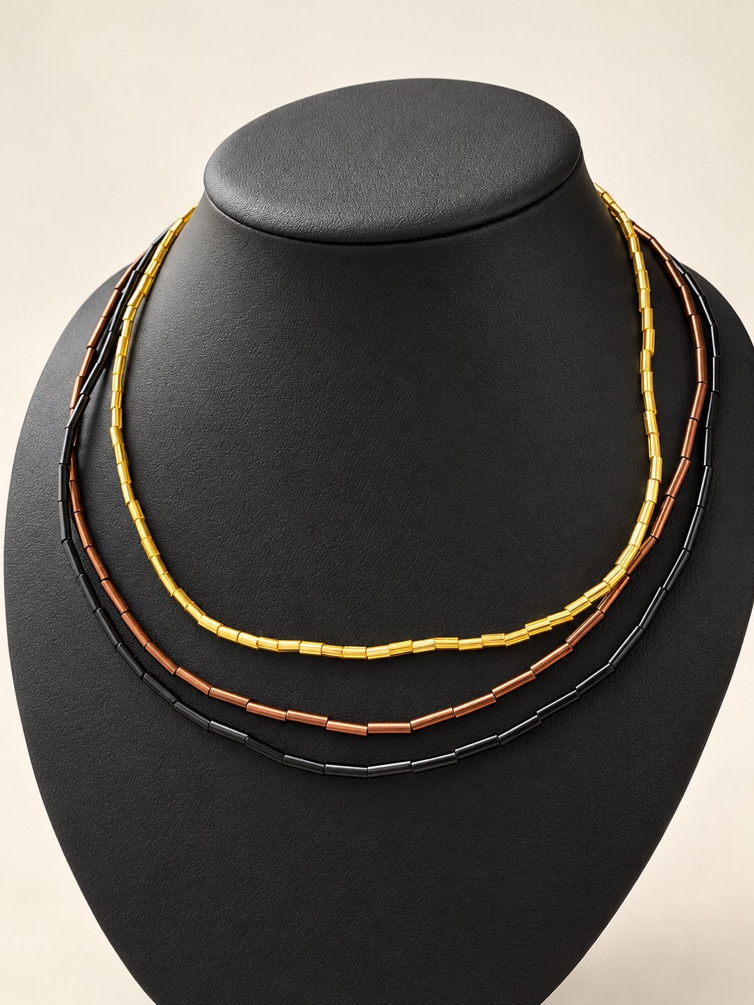 Set van 3 kralenkettingen in goud, koper en zwart, Ophalen of Verzenden, Zo goed als nieuw, Overige kleuren, Overige materialen