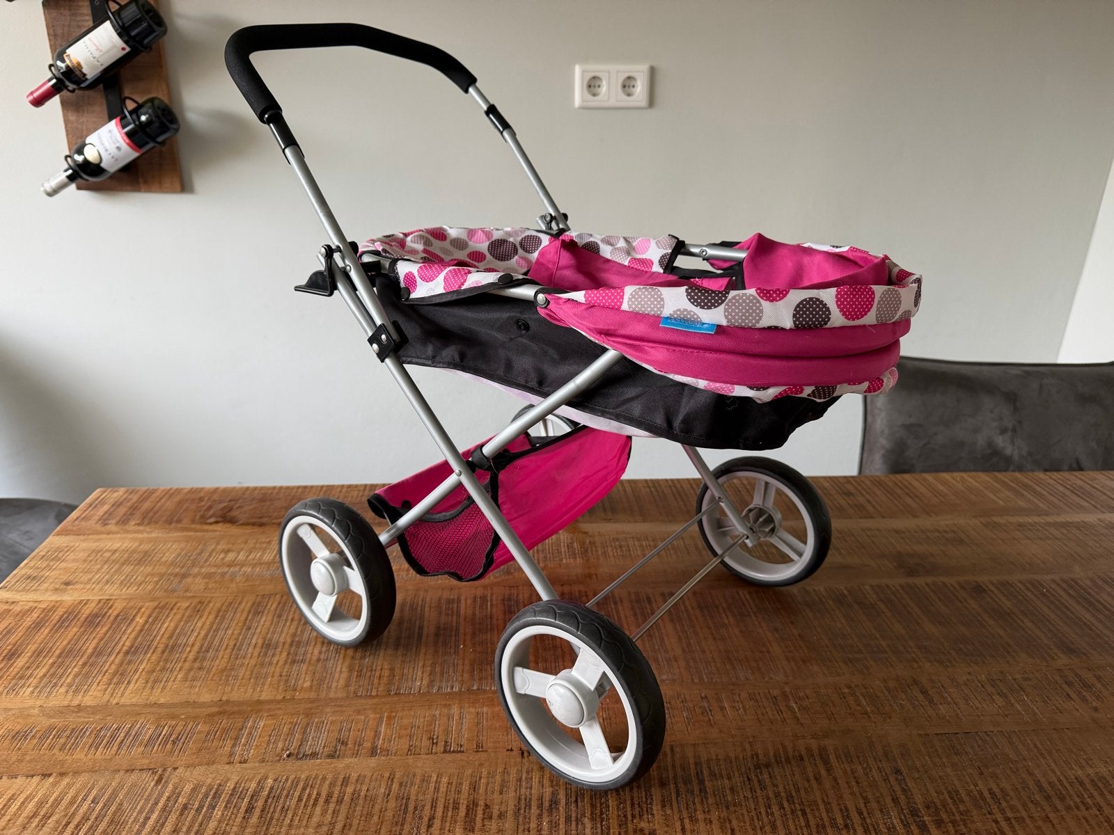 Roze poppenwagen met stippenpatroon, Ophalen of Verzenden, Gebruikt, Overige typen
