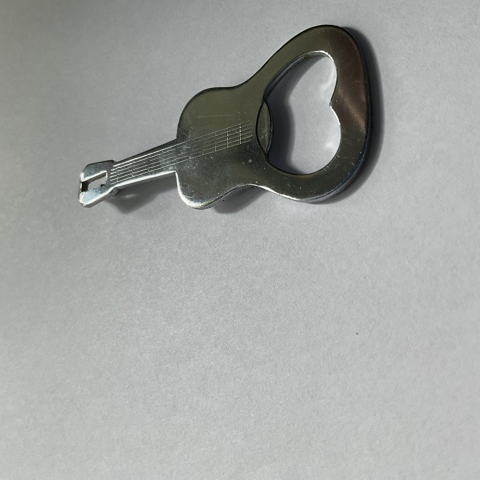 Flesopener in de vorm van een gitaar, Ophalen of Verzenden, Zo goed als nieuw, Flesopener, Overige merken