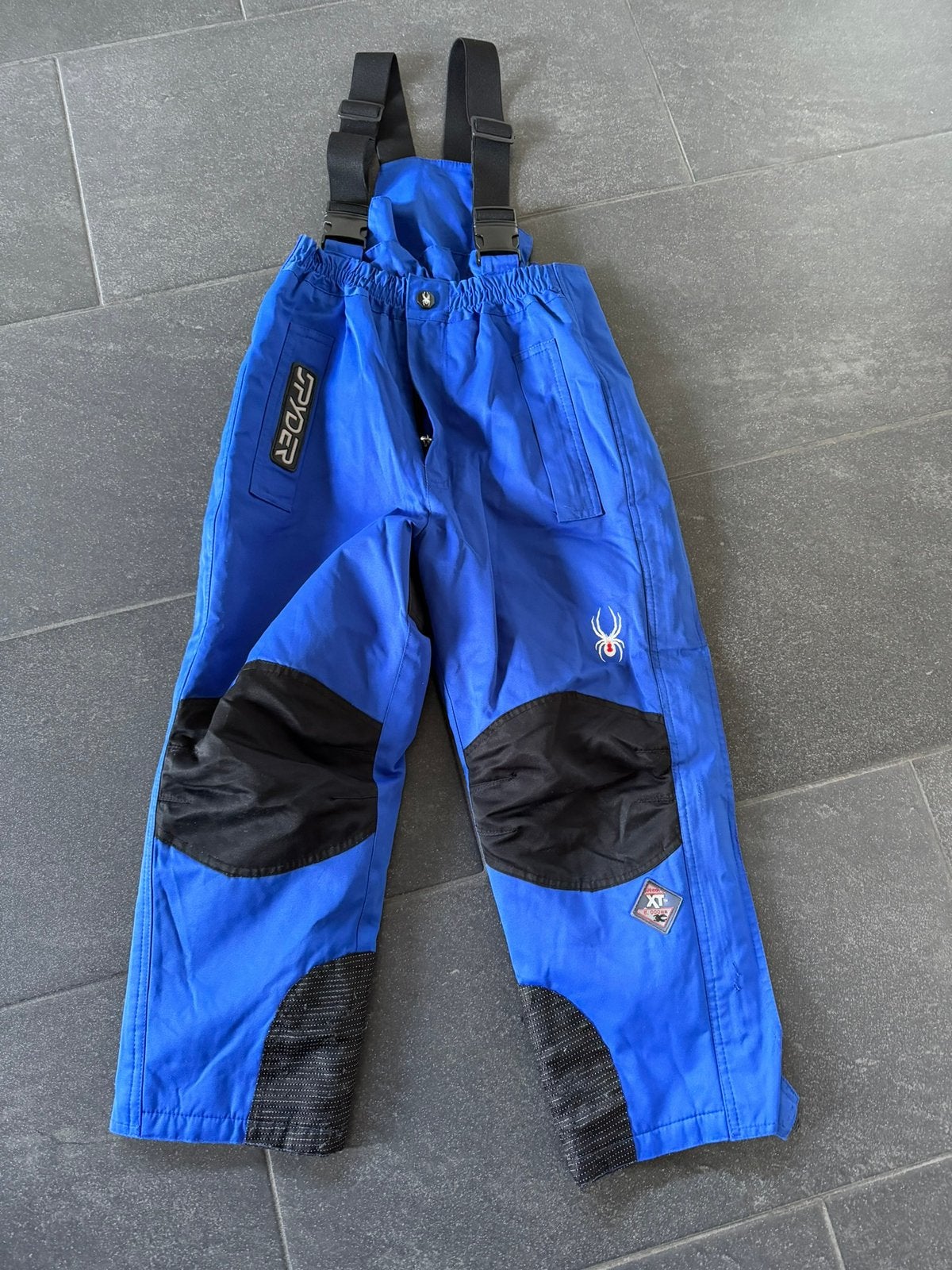 Skibroek kindermaat L blauw Spyder, Overige merken, Gebruikt, 100 tot 140 cm, Ophalen of Verzenden