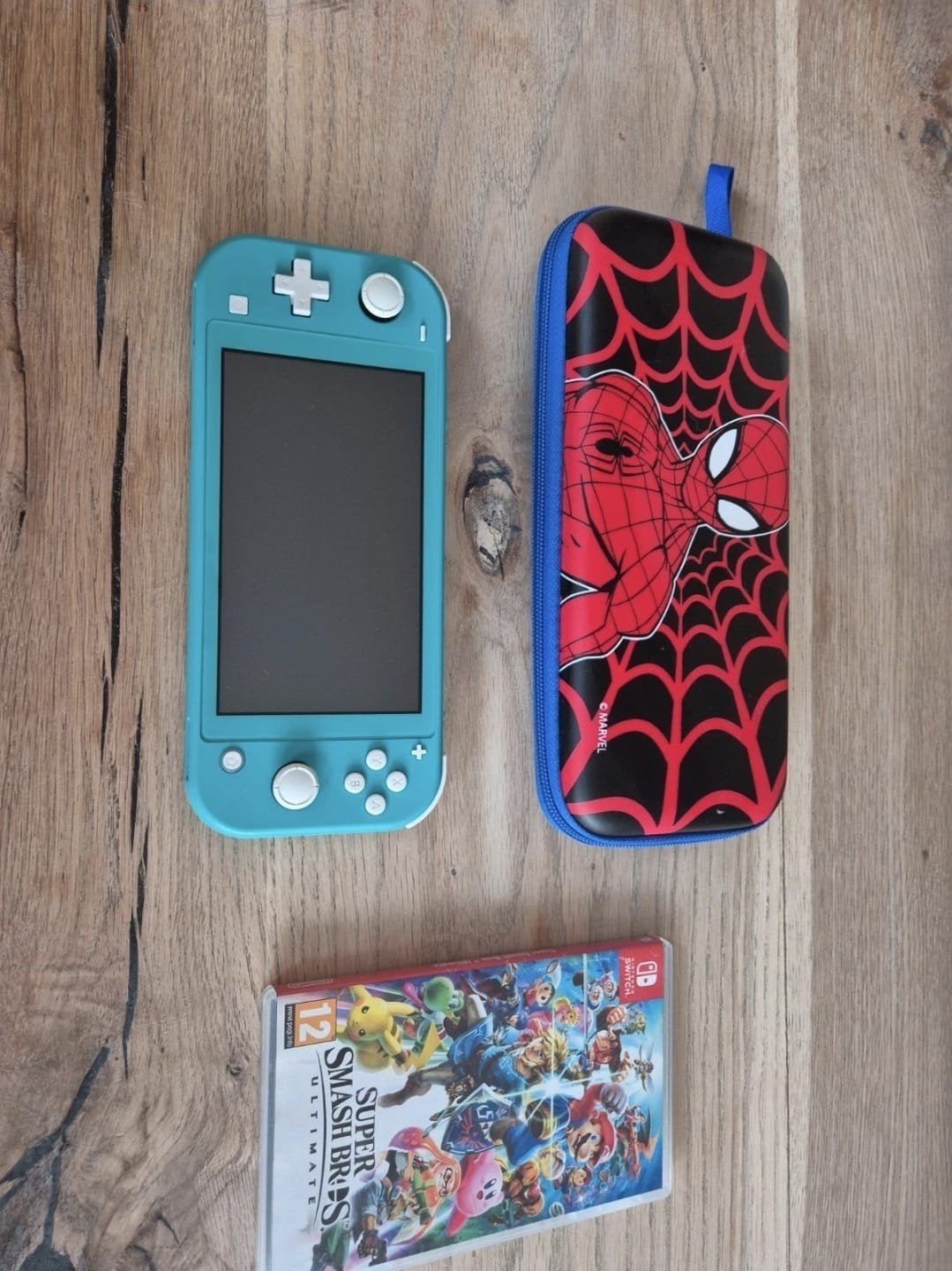 Nintendo Switch Lite Turquoise & Super Smash bros, Spelcomputers en Games, Spelcomputers | Nintendo Switch Lite, Ophalen of Verzenden