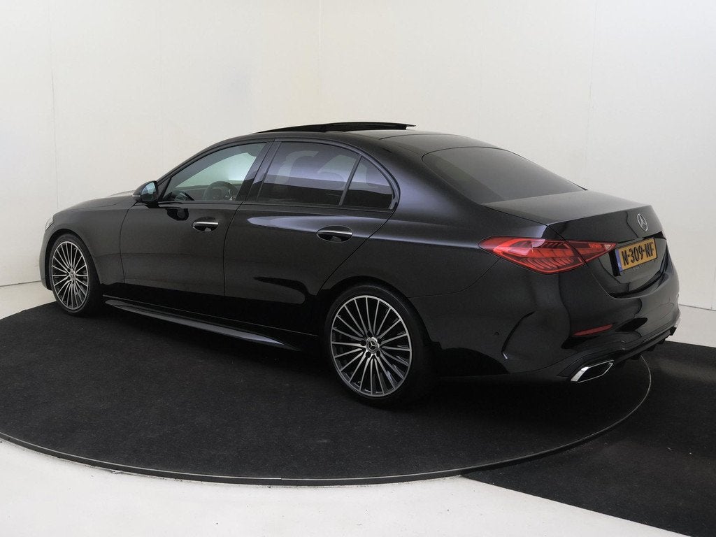 Mercedes-Benz C-klasse 180 AMG Line Panoramadak / Memory Sea, Auto's, Mercedes-Benz, Automaat, 4 cilinders, Leder en Stof, Zwart