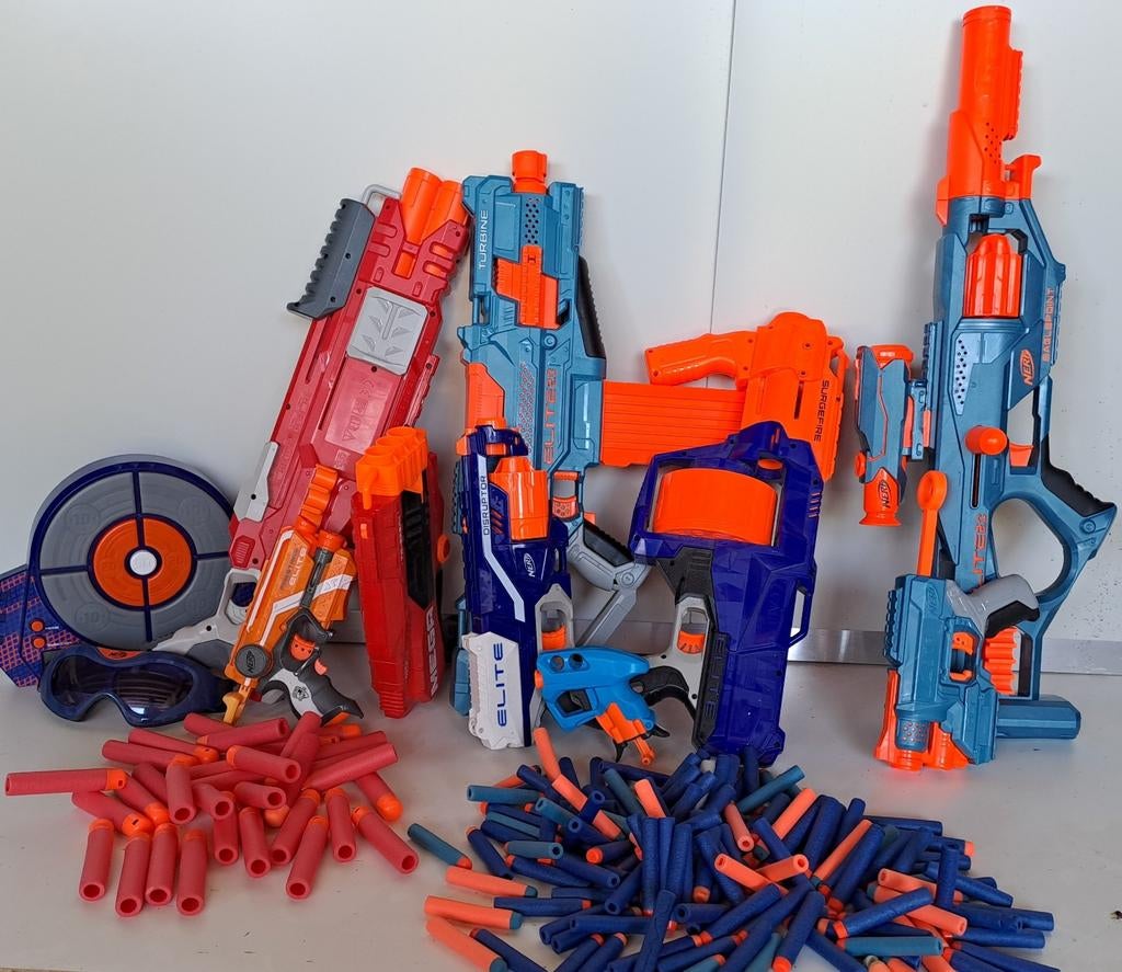 Nerf Gun Set: 9 Blasters, 130 Pijlen, Bril & Target, Ophalen of Verzenden, Zo goed als nieuw, Jongen of Meisje