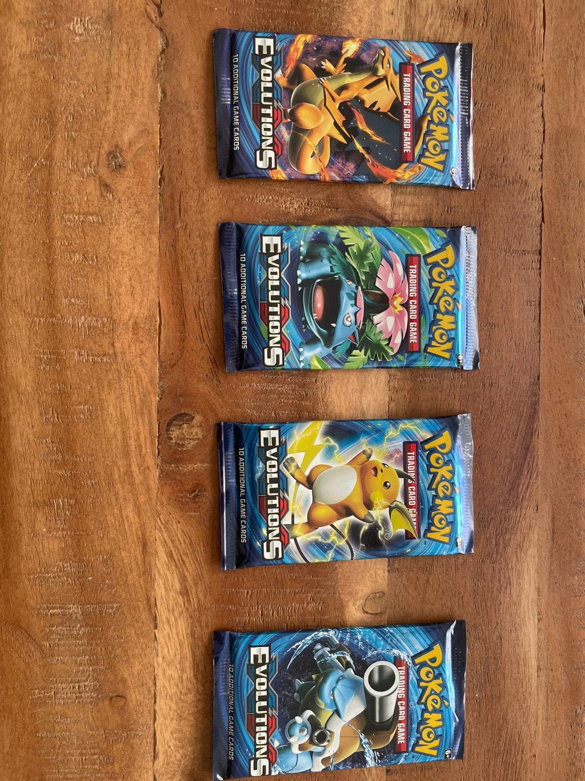 Pokemon evolutions xy art set 4 stuks, Ophalen of Verzenden, Zo goed als nieuw, Booster