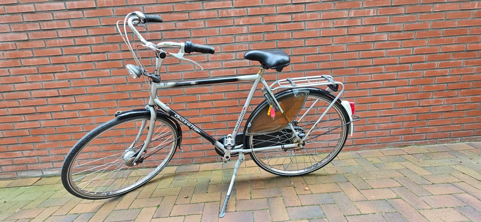 Nette Gazelle herenfiets met reservesleutel, Fietsen en Brommers, 57 tot 61 cm, Ophalen, Gebruikt, Gazelle
