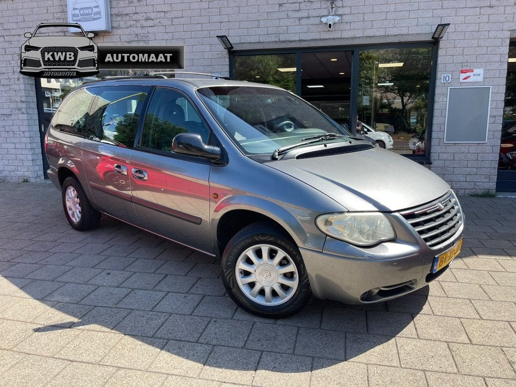 Chrysler Grand Voyager 3.3i V6 SE Luxe Trekhaak DVD 7Pers, Auto's, Automaat, 3301 cc, 450 kg, Gebruikt