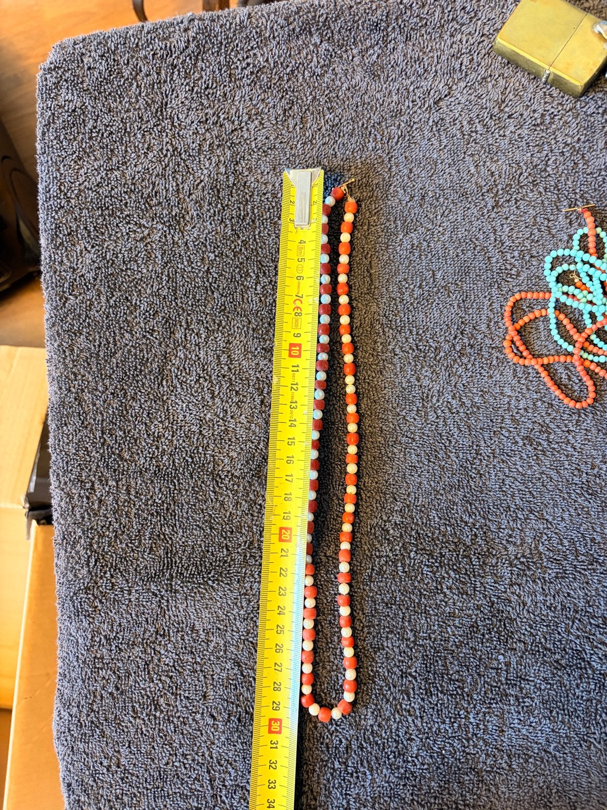 Kralenketting oranje en wit, ca. 34 cm lang, Met hanger, Gebruikt, Ophalen of Verzenden, Rood