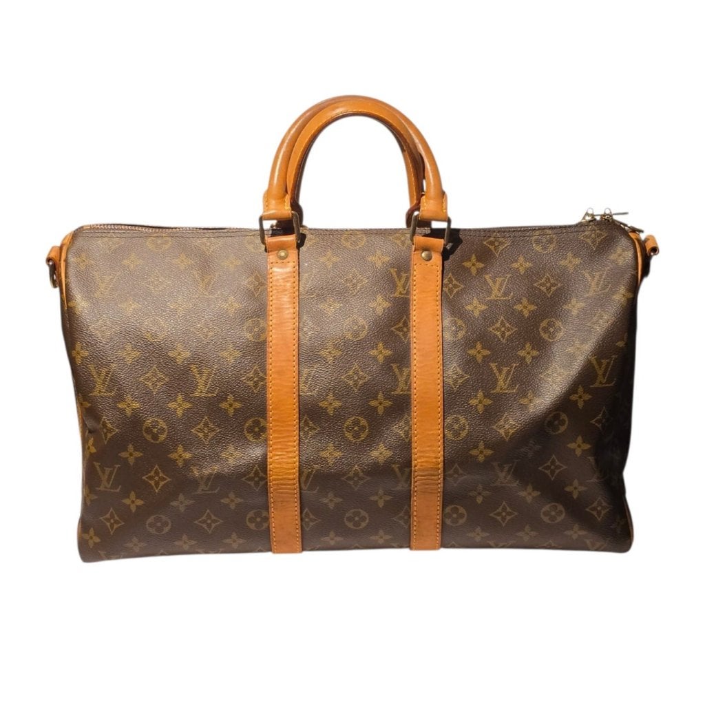 Louis Vuitton Keepall 45 Bandoulière Mono Brown 1993, Louis Vuitton, Gebruikt, Support@louisvuitton.com, 2 Rue du Pont Neuf
75001 Paris
France