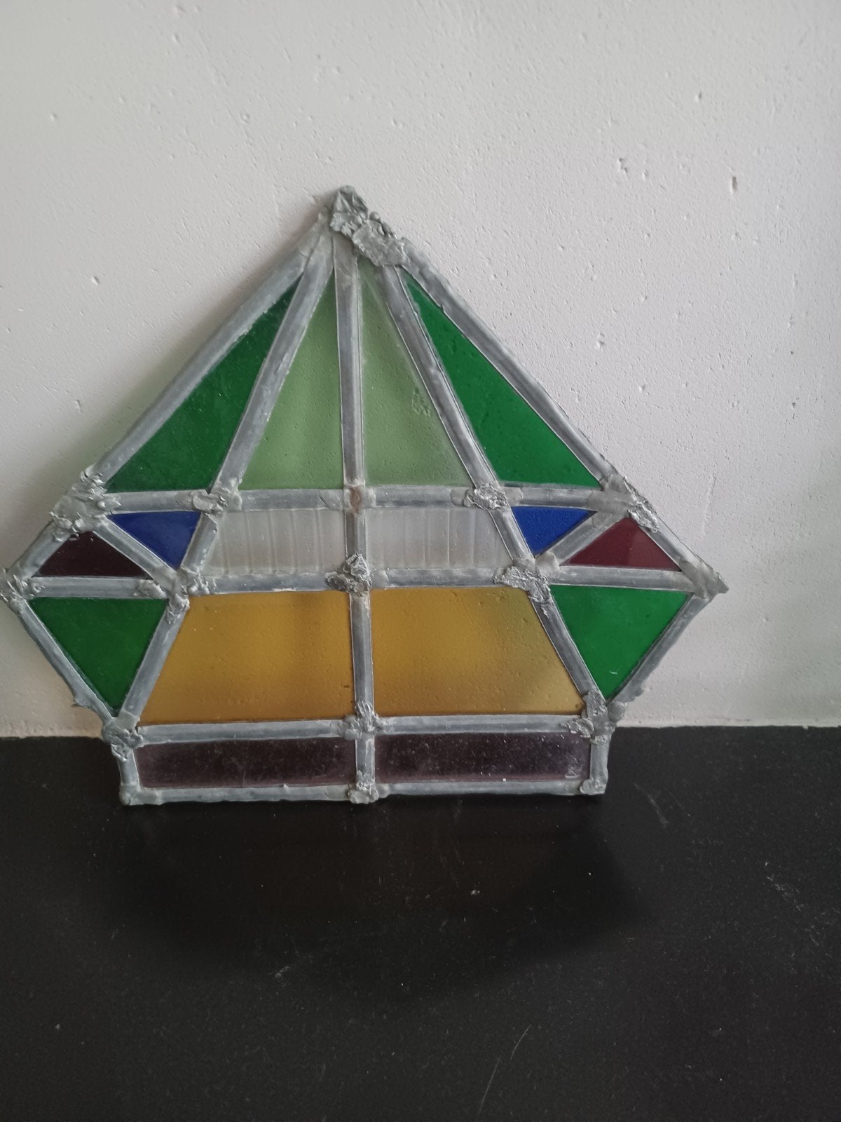 Antiek glas in lood ruitje, Ophalen
