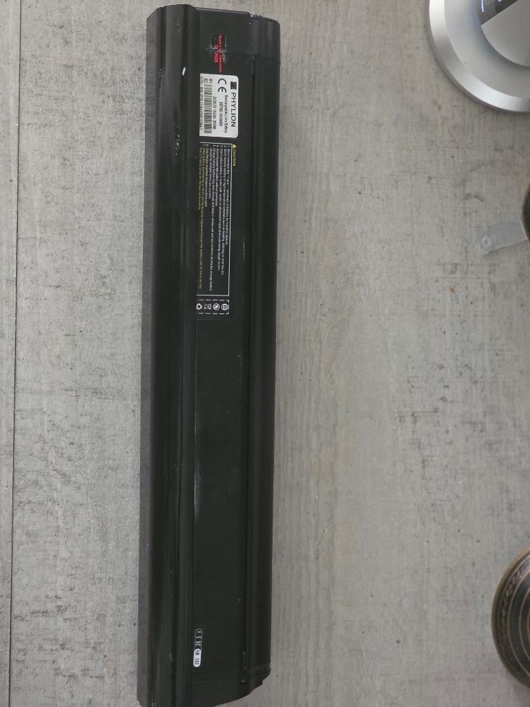 Phylion accu + oplader te koop (Amslod e-bike), Fietsen en Brommers, Fietsaccessoires | Fietsaccu's, Ophalen of Verzenden, Zo goed als nieuw